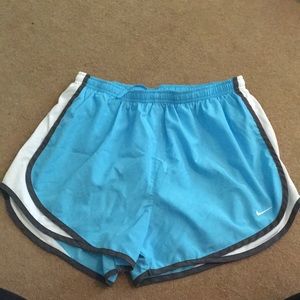 Light blue Nike running shorts